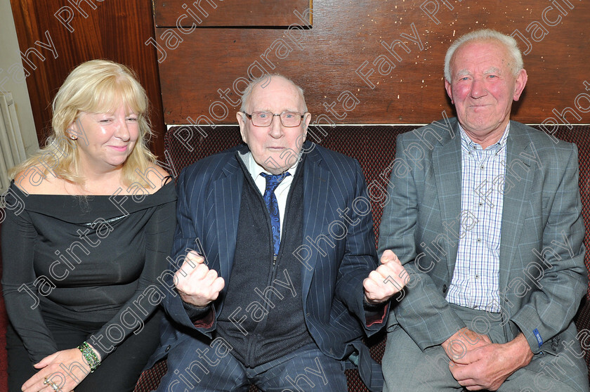 DSC 0033 
 Mick Mahon (centre) celebrating his birthday with Mary Galvin and Paddy Farragher.